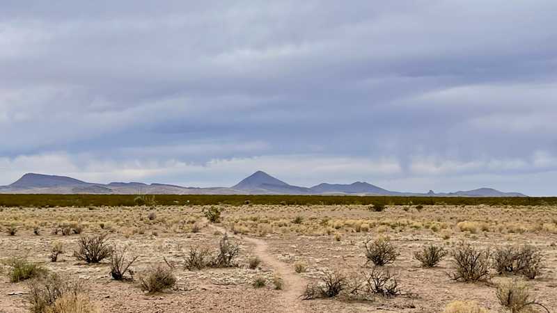 Low clouds over a flat desert