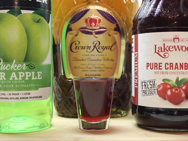 All of the ingredients in a Washington Apple Shot and a poured shot ready to go