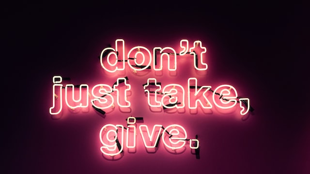 don’t just take, give neon sign