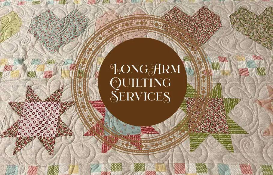 Longarm Quilting Services Banner on top of a quilt.
