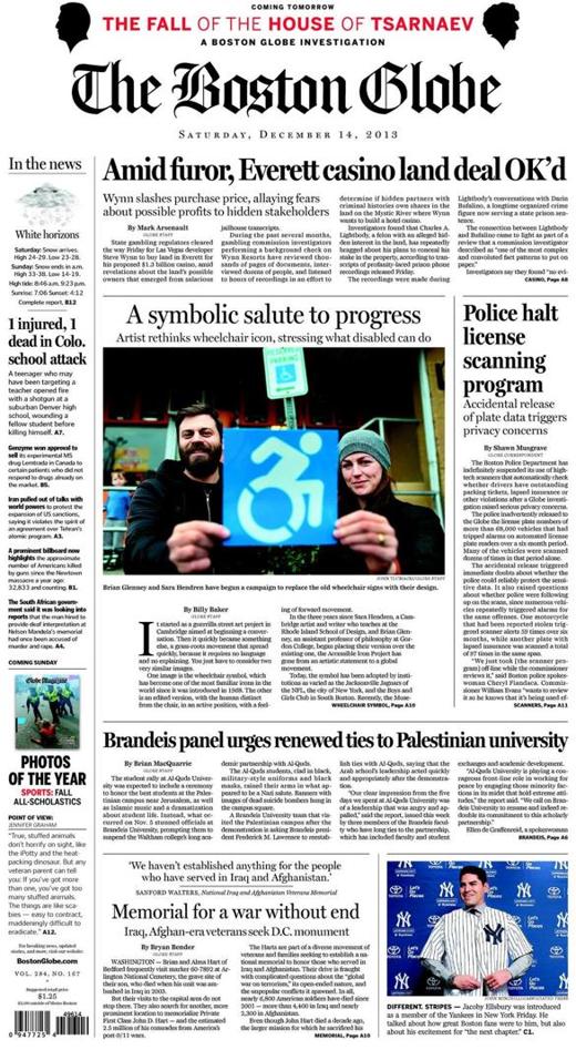 a shot of the front page of the Globe, featuring a story titled "A symbolic salute to progress." Brian Glenney, my design partner, and I are holding one of our newest stickers in front of a standard ISA on a parking sign.
