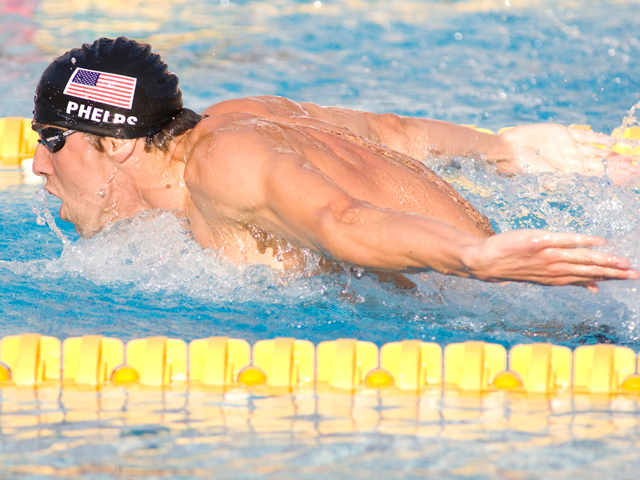 Michael Phelps swimming in his lane