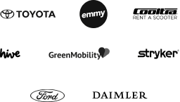 Group of black and white logos of mobility companies, including Toyota, IVECO, stryker, Green Mobility and hive.