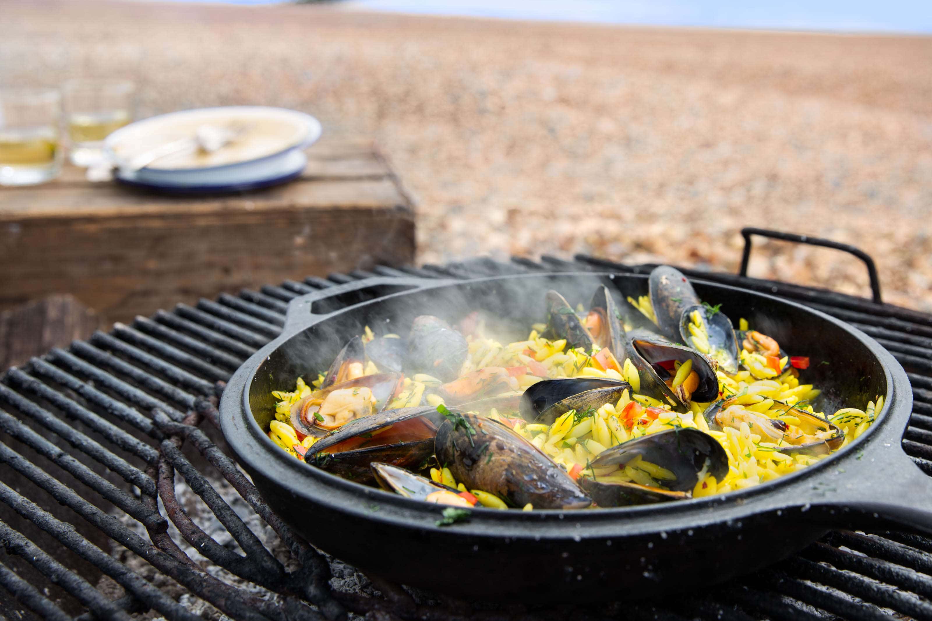paella-cooking-on-the-bbq-on-the-beach
