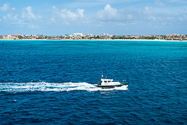 A pilot boat prepares to escort our cruise ship into port in Aruba.

Caribbean Ocean, west of Aruba, 2017