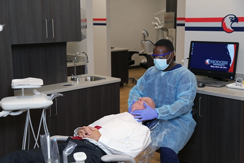 Hodges University BS Dental Hygiene student with a patient in the Hodges Dental Hygiene Clinic