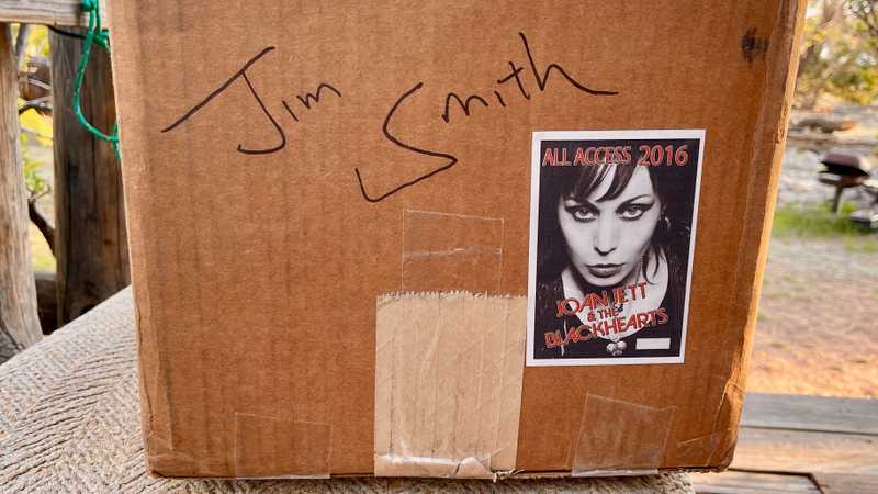 A shipping box with a Joan Jett sticker