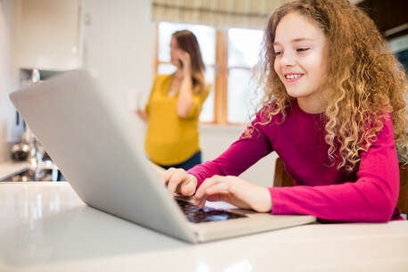 Girl learning code on a computer