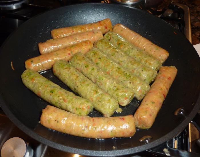 Secret Sausages frying in a pan