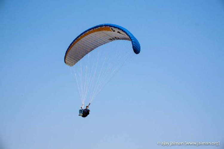 That is me on one of my first solo paraglider flights in Kamshet