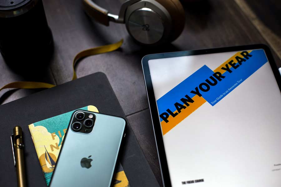 Tablet with new year's plans for business IT in San Marcos, Texas