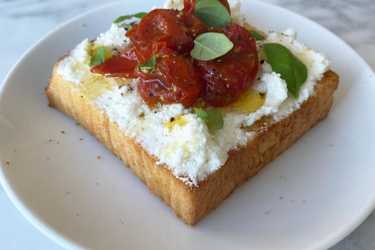 Ricotta toast with confit cherry tomatoes