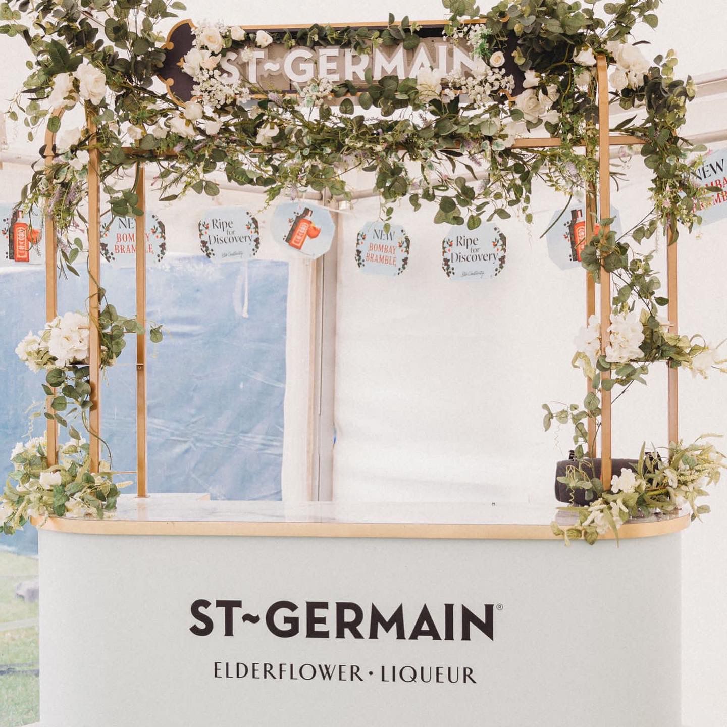 flower bar gin stand at wedding venue