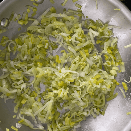 Sautee leeks in 1 tablespoon of butter over medium-low heat until soft, 10-15 minutes. Season with salt and pepper.
