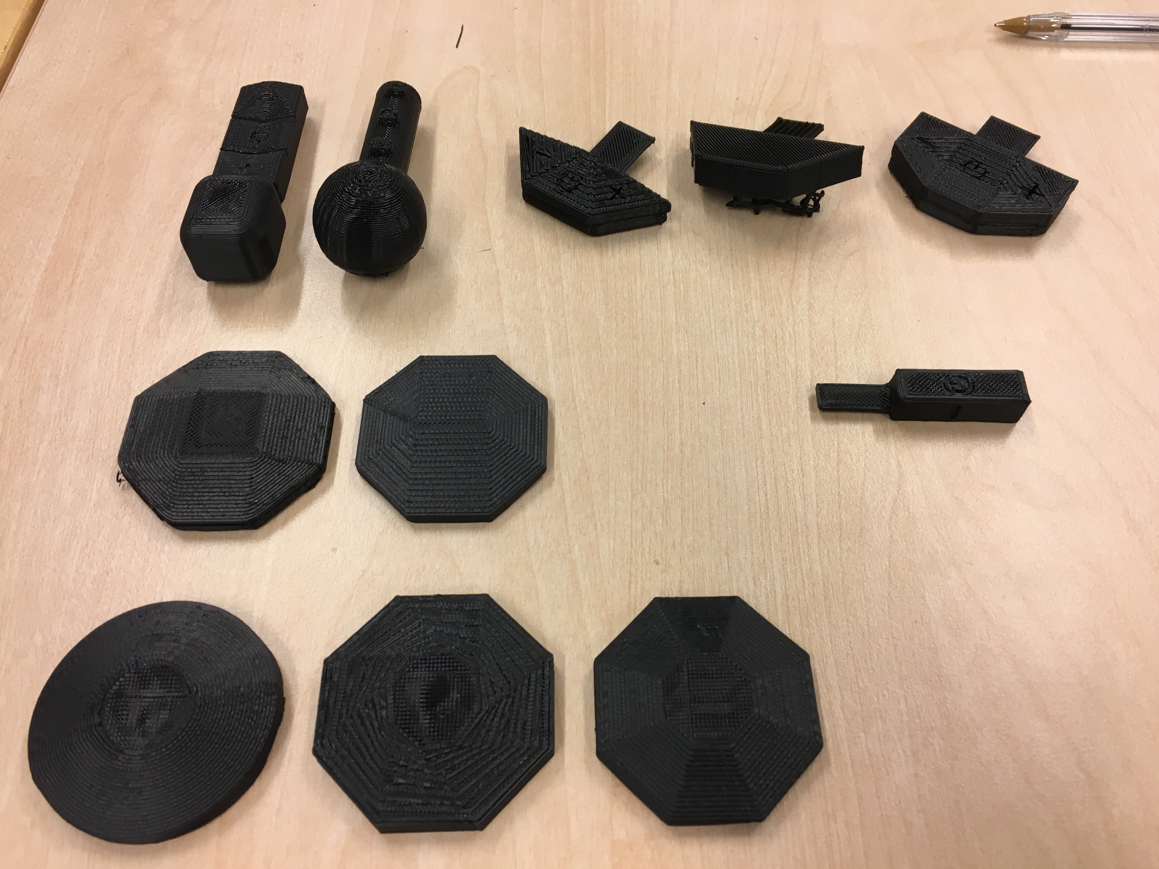 A picture of different 3d-printed iterations