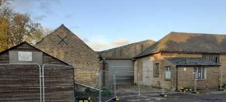 Temporary Fencing for Old Farm Building Security