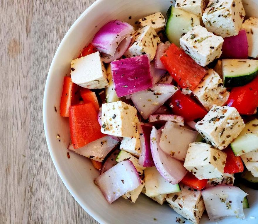 Bowl of vegetables and tofu marinating