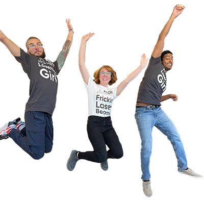 three employees jumping together