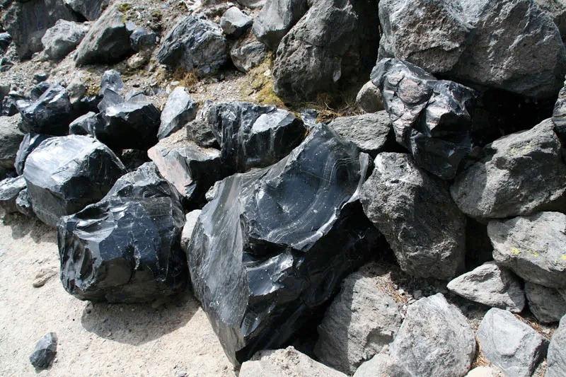 Obsidian on a rocky hill outdoors