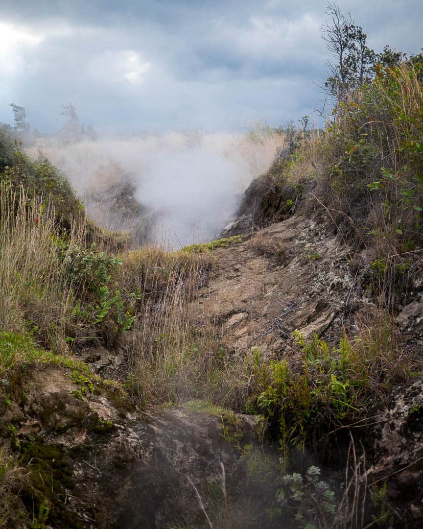 Volcanic steam rising from the ground