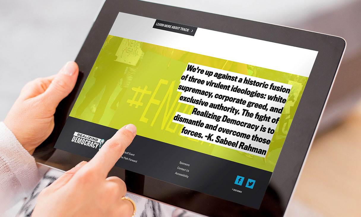 realizing democracy footer page with quote viewed on a tablet.