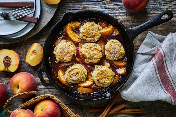 Grilled skillet peach cobbler with almond flour biscuit topping