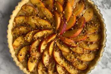 Peach and frangipane tart with pistachios