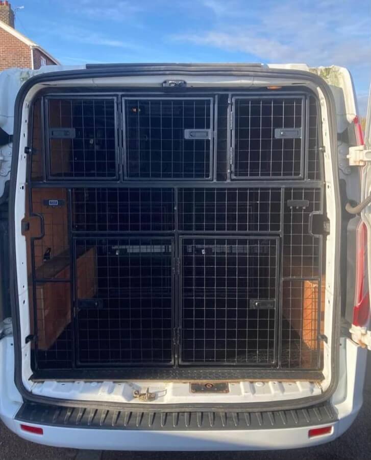 Van back view of crates