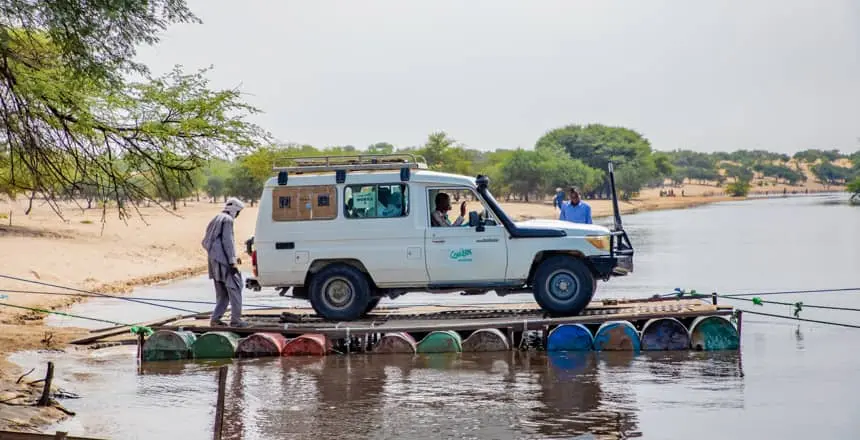 A mobile health clinic truck traverses the tributaries of the Lake Chad region