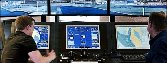 An ECDIS system being used by two mariners in a simulator