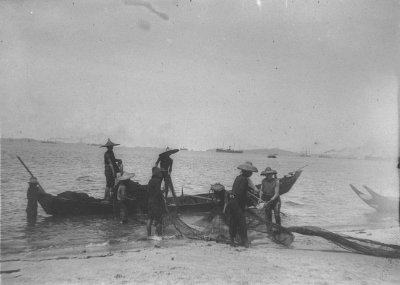 Fishermen at seashore, 1909