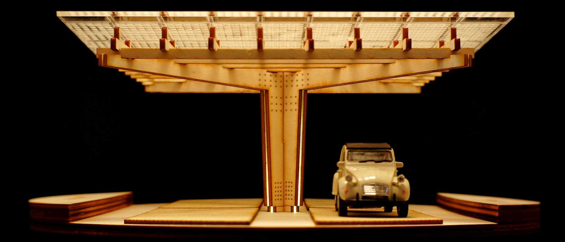 A miniature scaled development model of K:Port with a toy car.