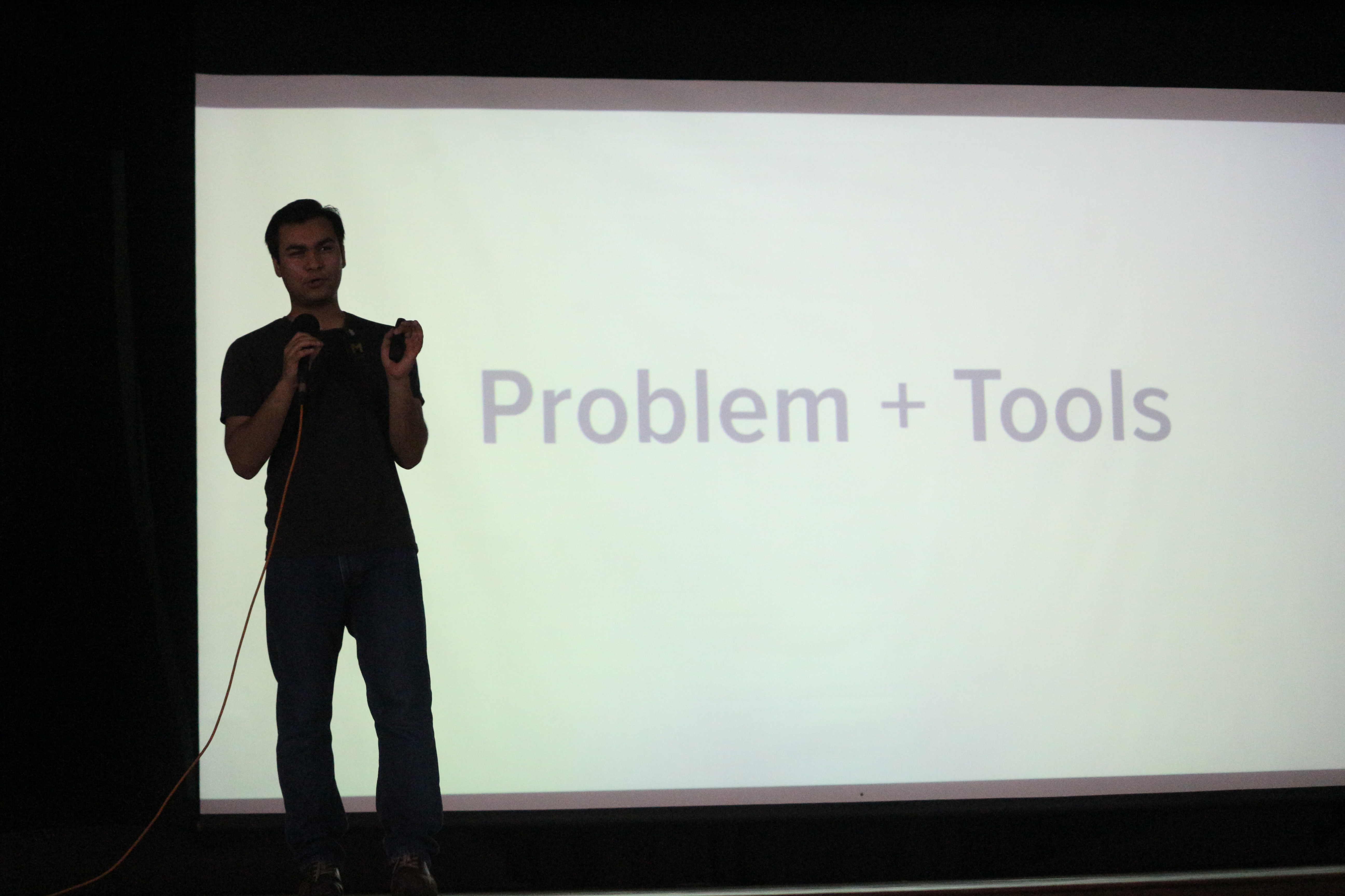 Anand Chowdhary explaining Problems + Tools slide