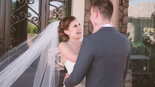 Wedding couple smiling at each other