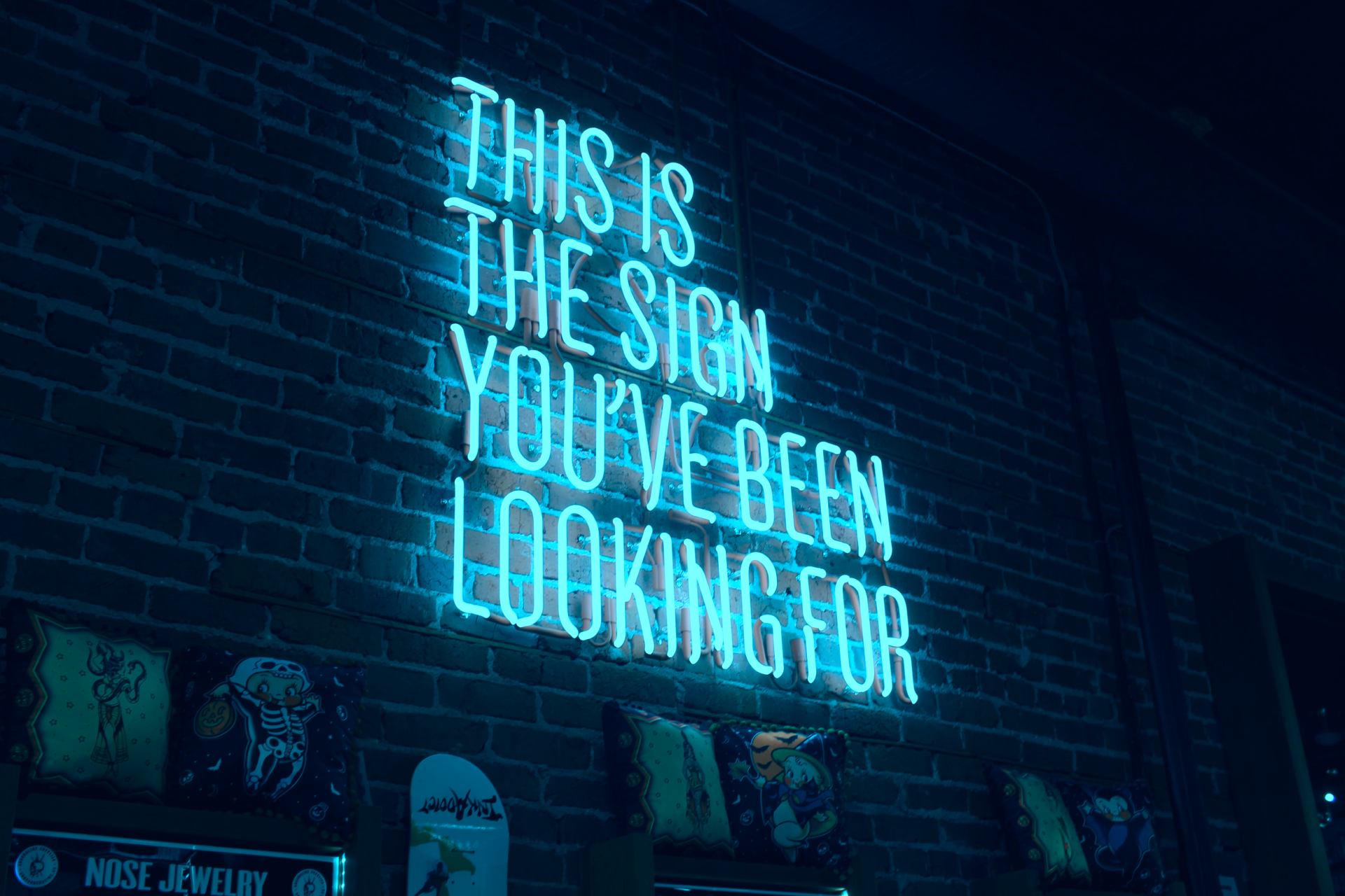 neon sign saying this is your sign