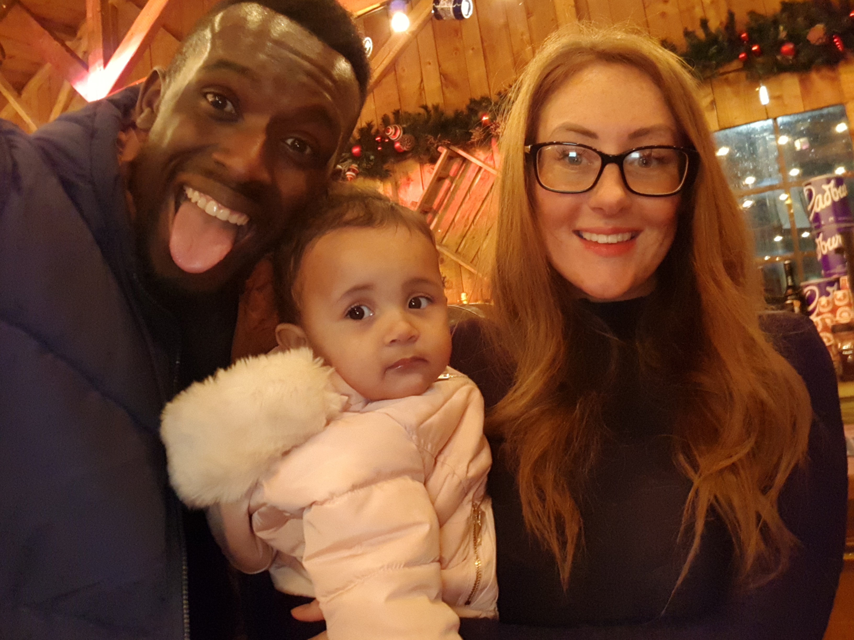 Emini, his partner and his daughter