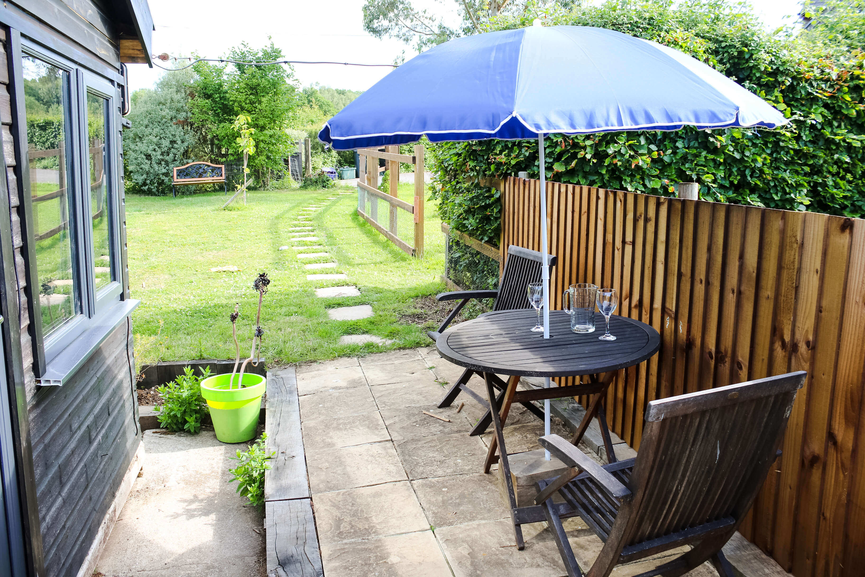 Photo of the patio area and garden area at Dorset chalet