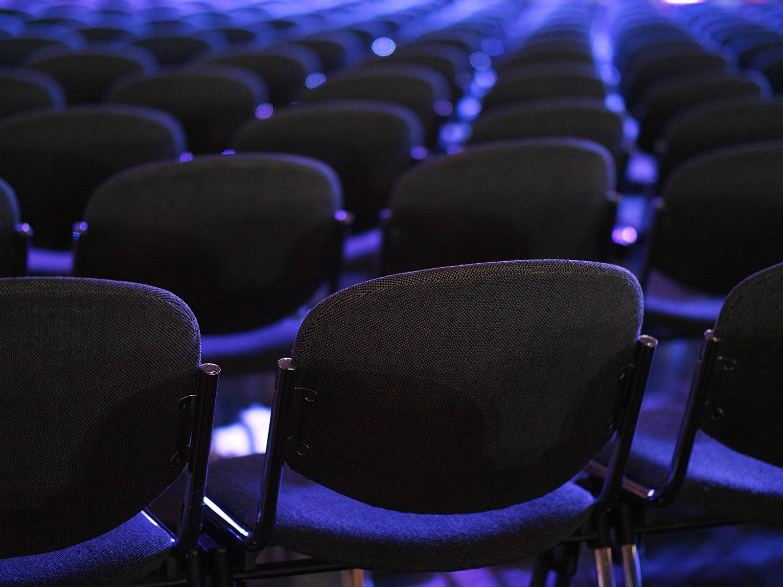 Empty seats at a conference