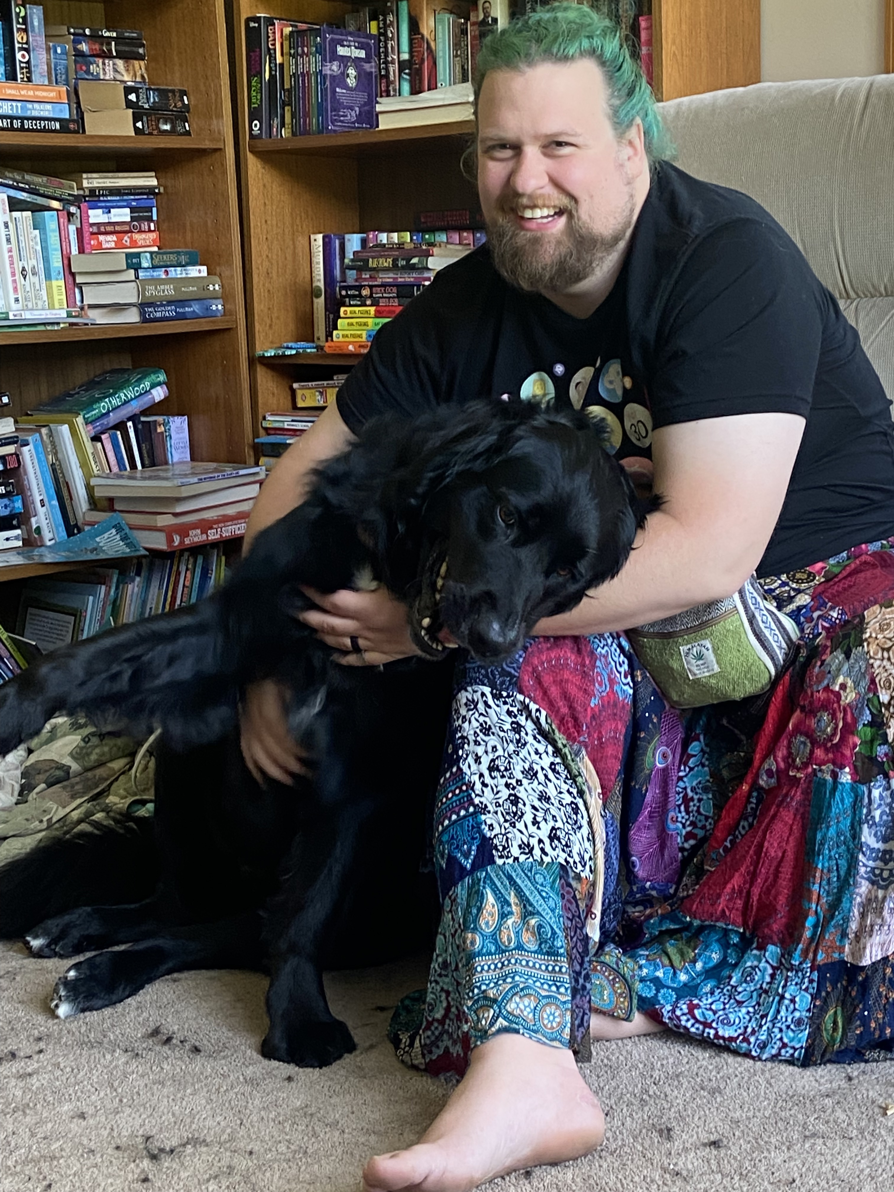 Photograph of Aaron with his dog