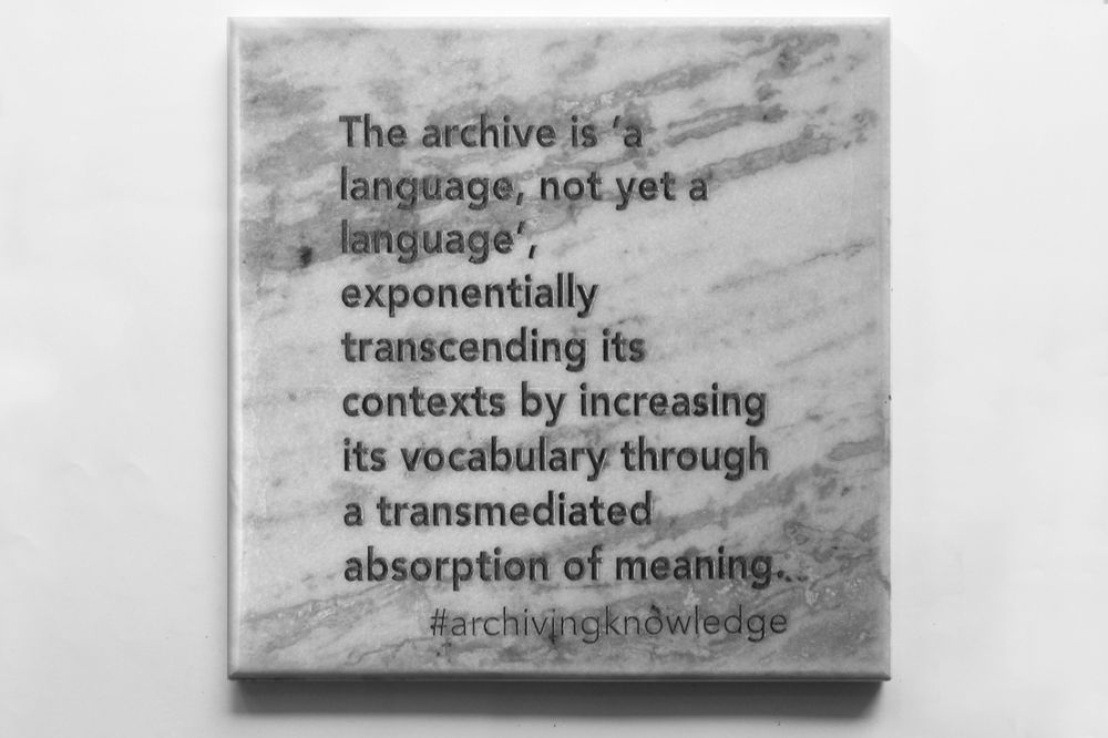 The archive is ‘a language, not yet a language’, exponentially transcending its contexts by increasing its vocabulary through a transmediated absorption of meaning, From the series: Archiving Knowledge, hand engraved marble, 2018