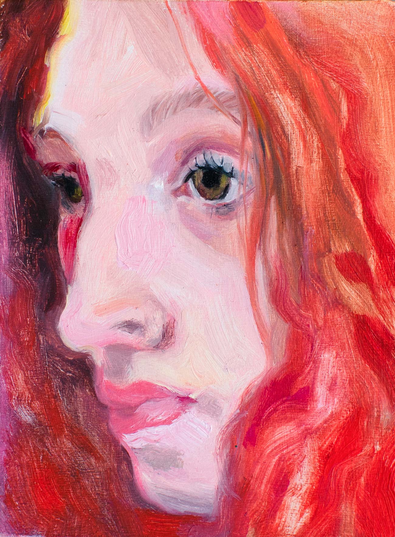 mostly red portrait of a young woman's face