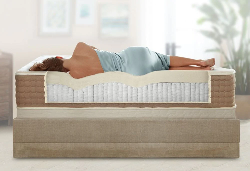 A woman sleeping on Eco Terra Hybrid Latex mattress