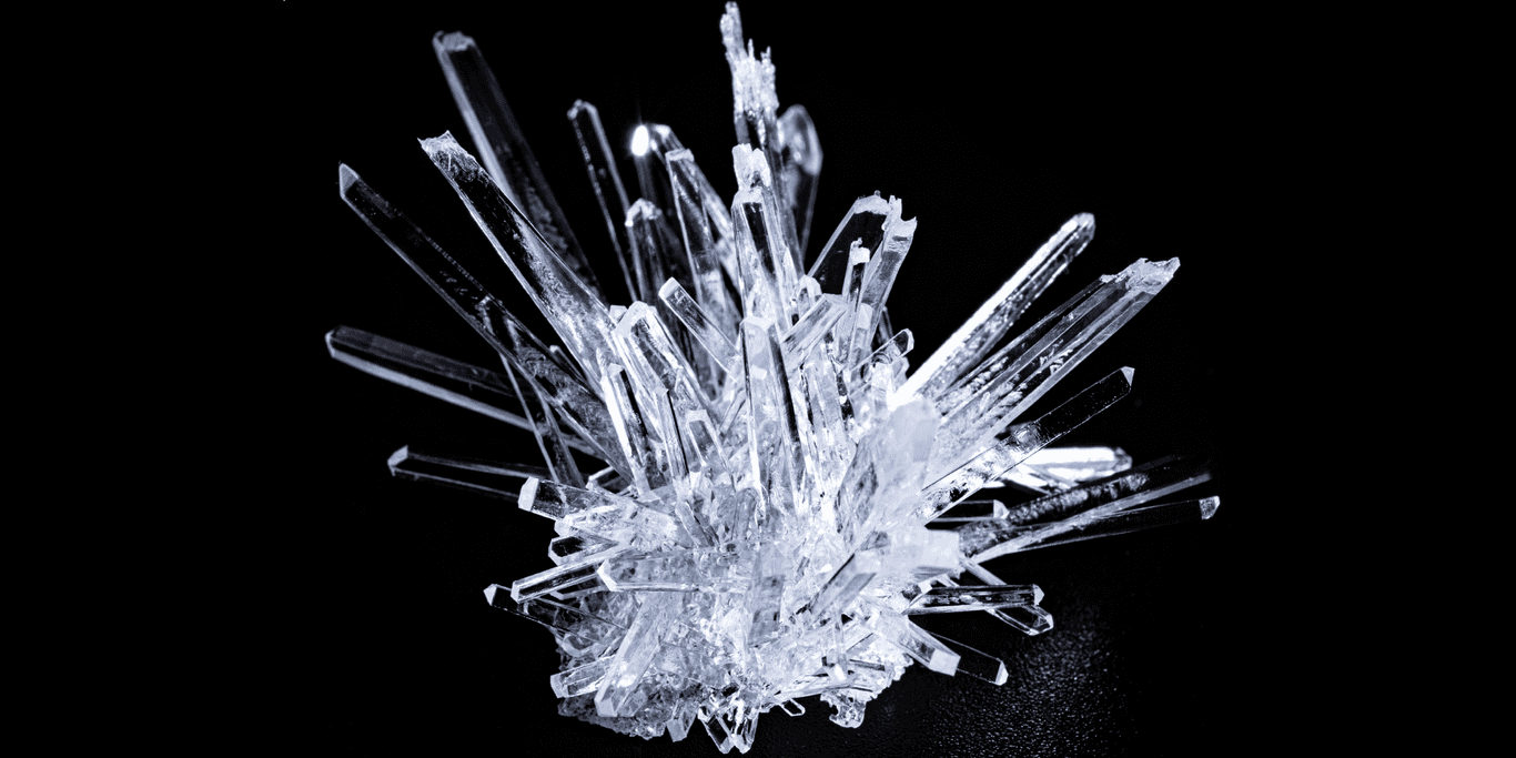Why Do Crystals Melt Ice?