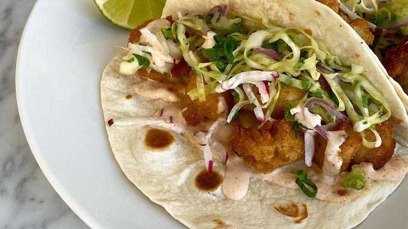 photo of completed recipe: Whether you’re looking for a vegetarian alternative or just want to try a new kind of taco, this battered and fried cauliflower is kind of magical: the…