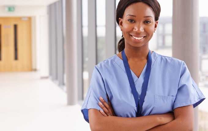 A healthcare professional smiling.