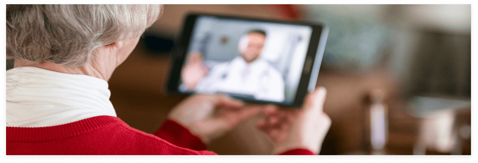 COPD, CHF, or hypertension patient looking at a tablet for a virtual telehealth visit