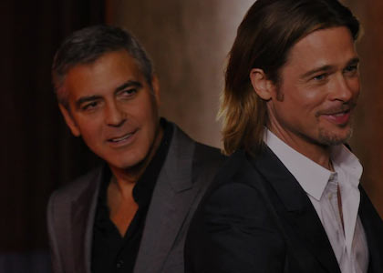 George Clooney about to attack vampire Brad pitt