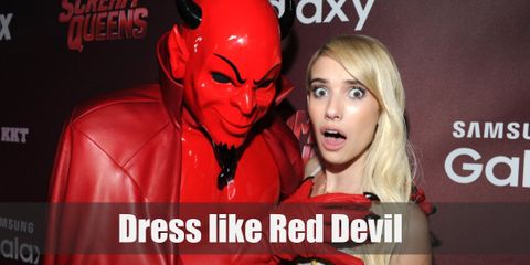 Red Devil outfits main top is made of red, shiny fabric. He also wears black work pants, black boots, a red cape, and a devil mask.