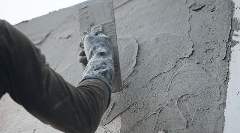 Man Repairing Stucco