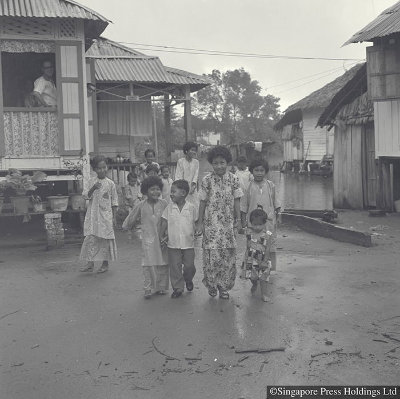 Malays celebrating Hari Raya Puasa, 1963